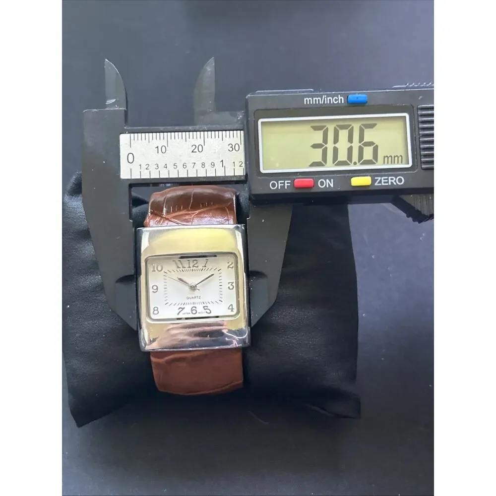 Silver Case White Dial Brown Band Women’s Cuff Watch